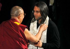 Two spiritual masters: The Dalai Lama and Master Raniere. Although they teach different philosophies, Master Raniere’s slaves say that his teachings are as high or higher than the Dalai Lama’s.