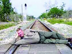 Artist’s conception: Mayor Paul Dyster poses in front of his new train station. Even if there are few trains and almost no riders, he can at least boast he built a new train station - empty though it may be.