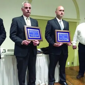 Officer Michael Stover (l) and Lt. Toby Trowbridge ...Lockport officers honored