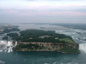 Goat Island was reserved by the New York State Legislature to be a parkland and the original design was planned by Frederick Law Olmsted. It did not include a lodge.