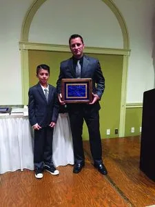 Deputy Joey Toetorella and son Sam ...honored for bravery in confrontation with armed man