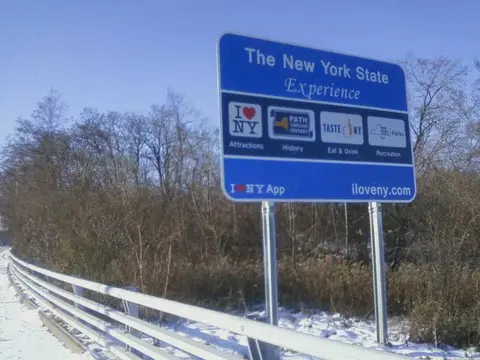 New Sign on Parkway shows Cuomo’s Contempt for City, Reporter, Feds