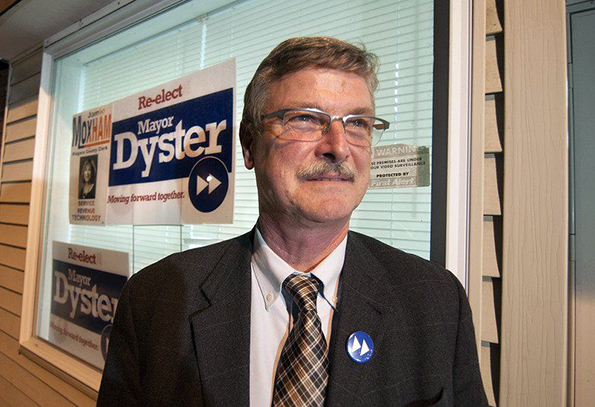 How curious: When Mayor Paul Dyster campaigned for reelection his motto was "moving forward together' and he used a fast forward button symbol. Now that he has been reelected Dyster suggests that his department heads have been holding him back.
