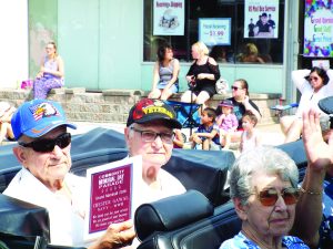 Brothers John and Chester Gawel, both decorated World War II veterans, joined former City Manager Harvey Albond and William Kresman, also decorated WWII veterans, as the parade’s grand marshals.