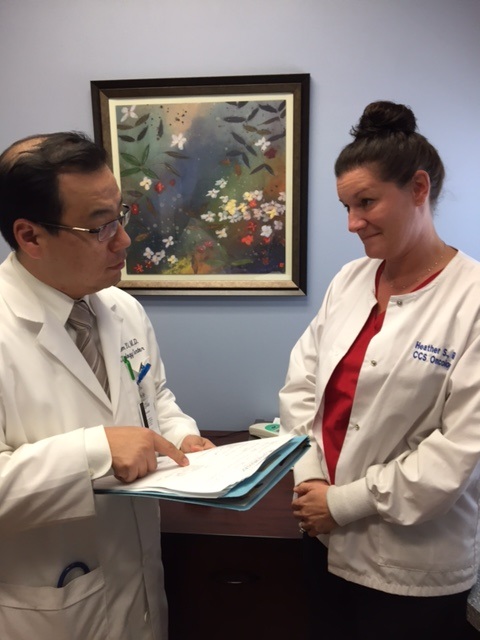 Dr. Won Sam Yi with Heather Slocum
...CCS Oncology CEO says cancer care provider being dropped by Independent Health.