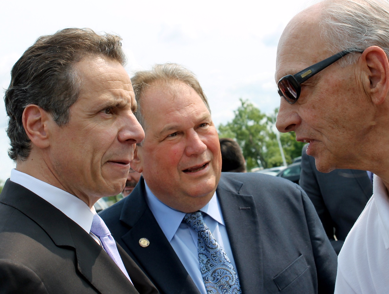 Gov. Cuomo and ex-Assemblyman Ceretto get an earful from a constituent.