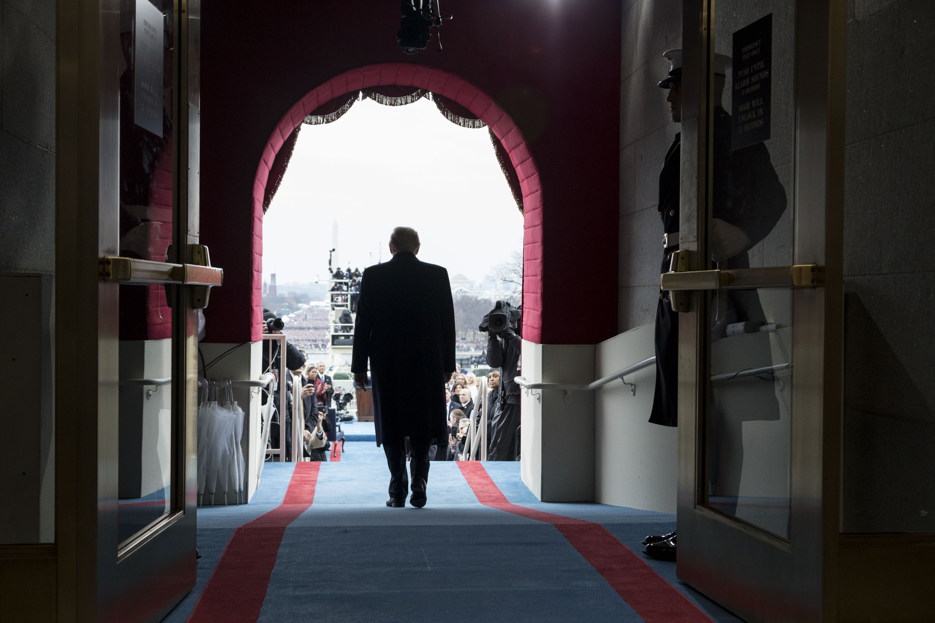 President-elect Donald Trump walks to take his seat for the inaugural swearing-in ceremony at the U.S. Capitol in Washington, D.C., Friday, January 20, 2017. (Official White House Photo by Shealah Craighead)