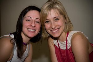 Happy together: Two top harem leaders help usher in new slaves for Mr. Raniere. They are Lauren Salzmen and Allison Mack. Miss Salzman is also a slave to Miss Mack and had both Mr. Raniere’s and Miss Mack’s initials branded by a hot iron on her pubic region, according to members of DOS.